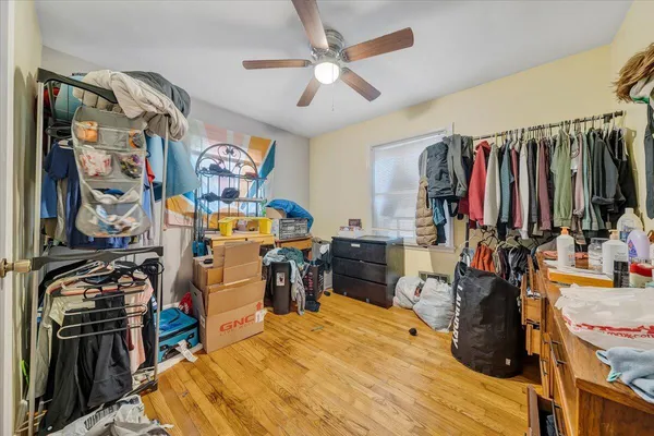 a bed room with a bed and a walk in closet