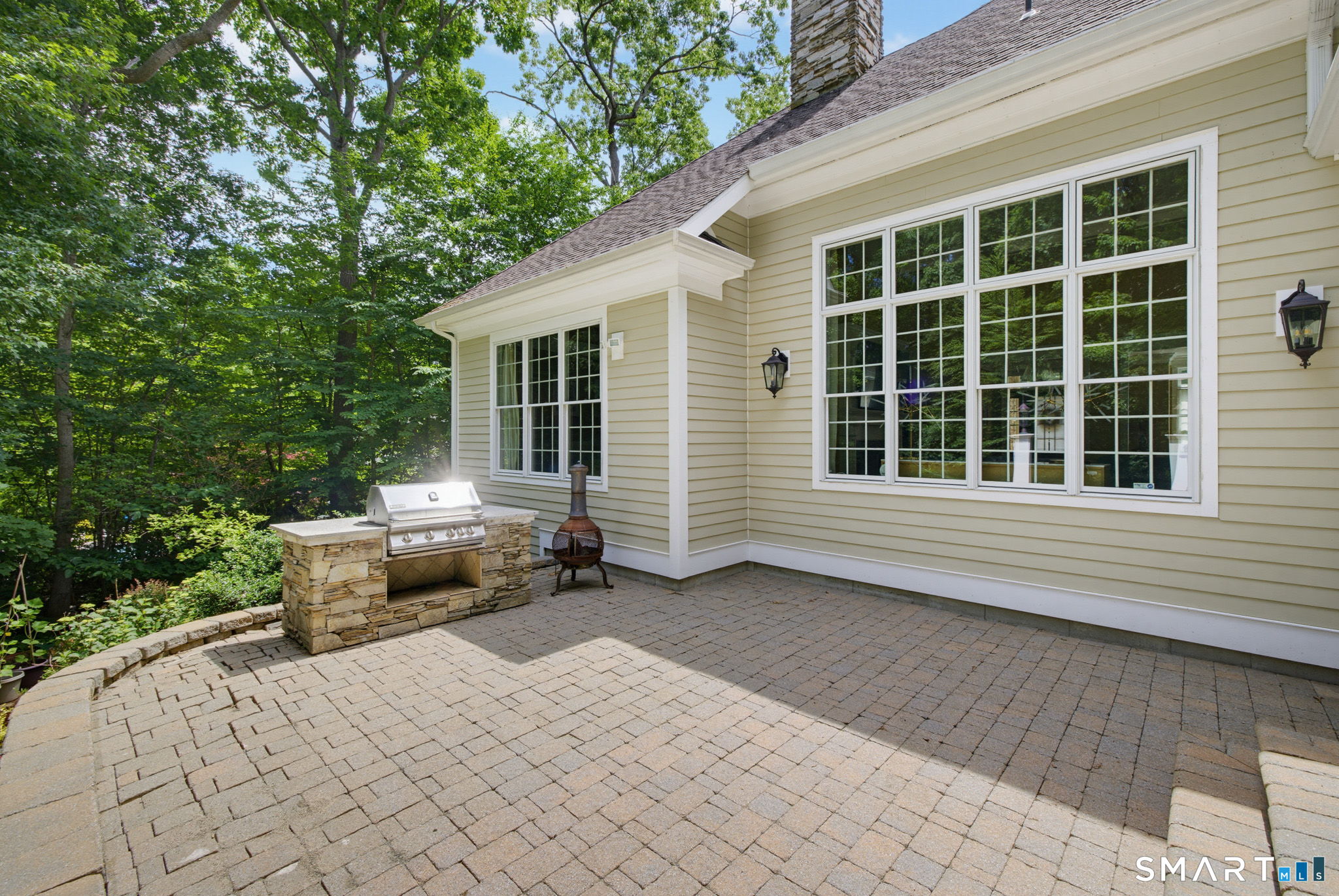 158 Appian Way Coventry, CT 06238 - Photo 3 of 40 a backyard of a house with seating space