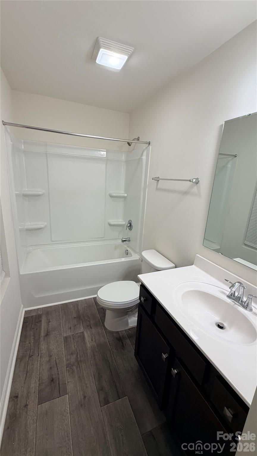 7209 Lenton Road, Unit 23 Charlotte, NC 28215 - Photo 11 of 17 a bathroom with a sink a toilet and shower