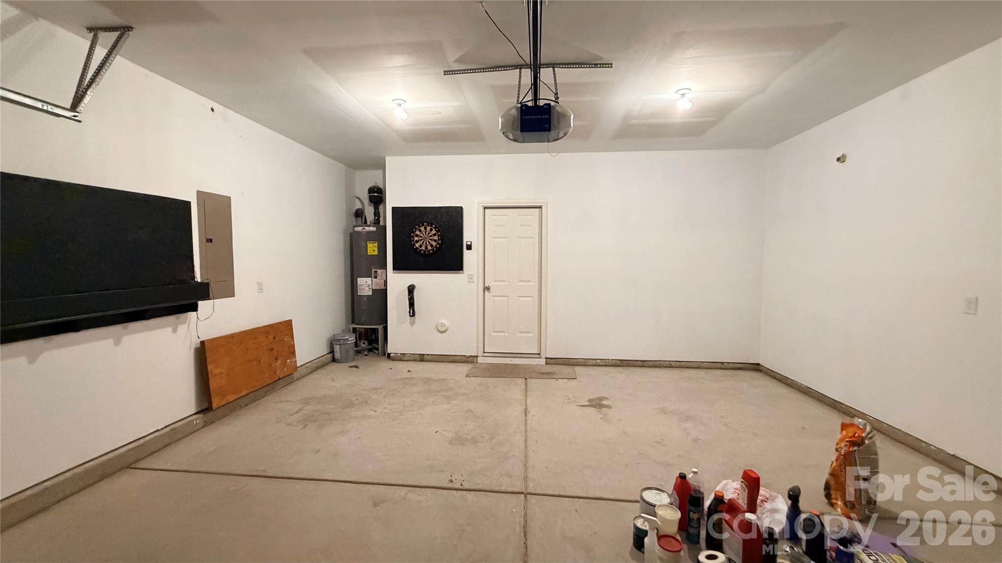 7209 Lenton Road, Unit 23 Charlotte, NC 28215 - Photo 8 of 17 a view of a livingroom with furniture and a flat screen tv