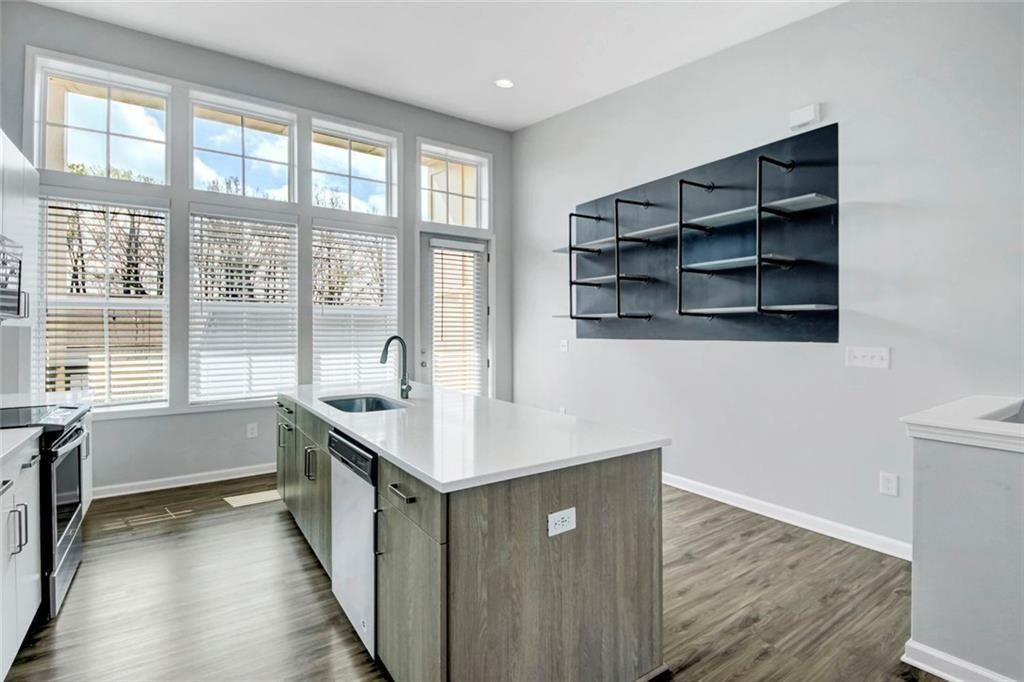 900 Brees Court Atlanta, GA 30318 - Photo 12 of 33 a kitchen with a sink and a window