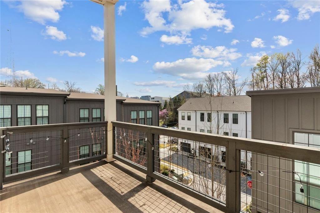900 Brees Court Atlanta, GA 30318 - Photo 16 of 33 a view of a brick house with large windows