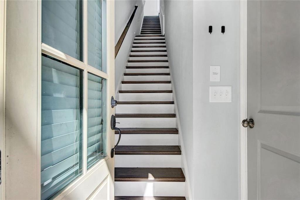 900 Brees Court Atlanta, GA 30318 - Photo 17 of 33 a view of entryway and hall with wooden floor