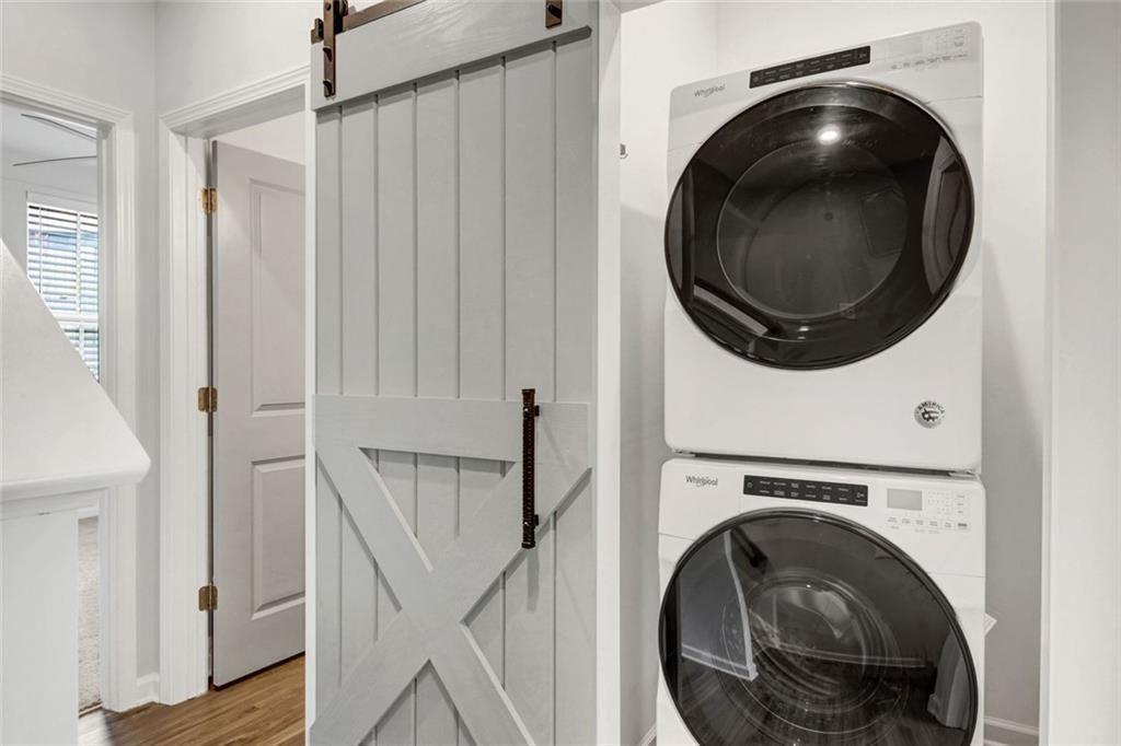 900 Brees Court Atlanta, GA 30318 - Photo 21 of 33 a view of a hallway with washer and dryer