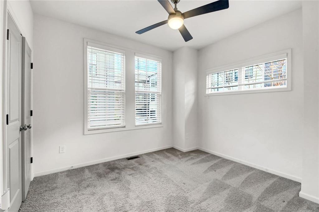 900 Brees Court Atlanta, GA 30318 - Photo 23 of 33 a view of an empty room with a window