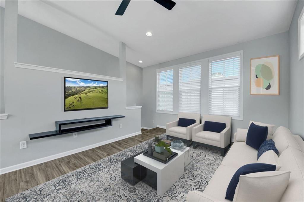 900 Brees Court Atlanta, GA 30318 - Photo 4 of 33 a living room with furniture and a flat screen tv