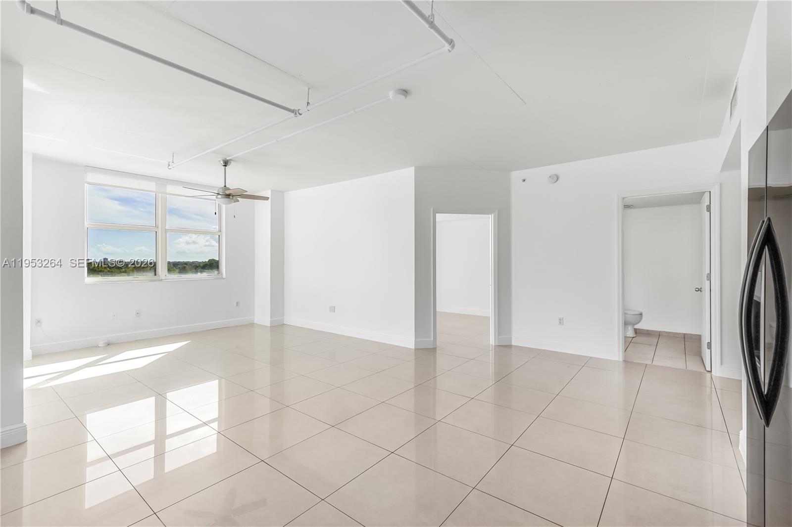 3180 Southwest 22nd Street, Unit 601 Miami, FL 33145 - Photo 17 of 29 a view of an empty room and window