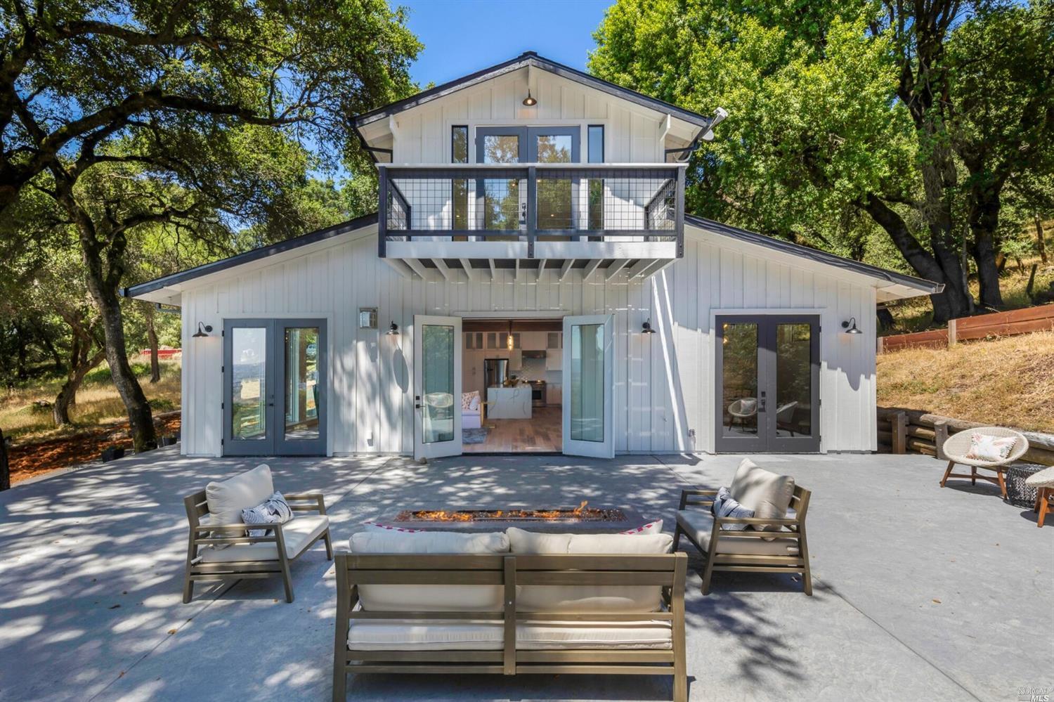 1400 Warrington Road Santa Rosa, CA 95404 - Photo 1 of 1 a front view of a house with yard outdoor seating and a tree