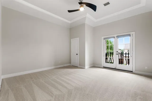 a view of a room with a large window