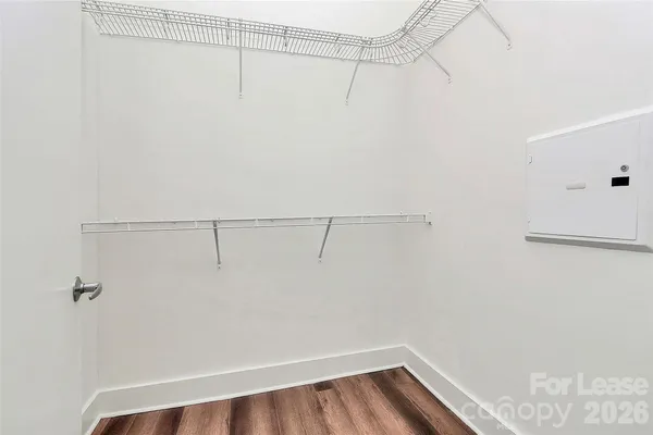 a view of a room with racks on the wall