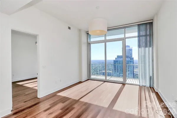 a view of an empty room and window