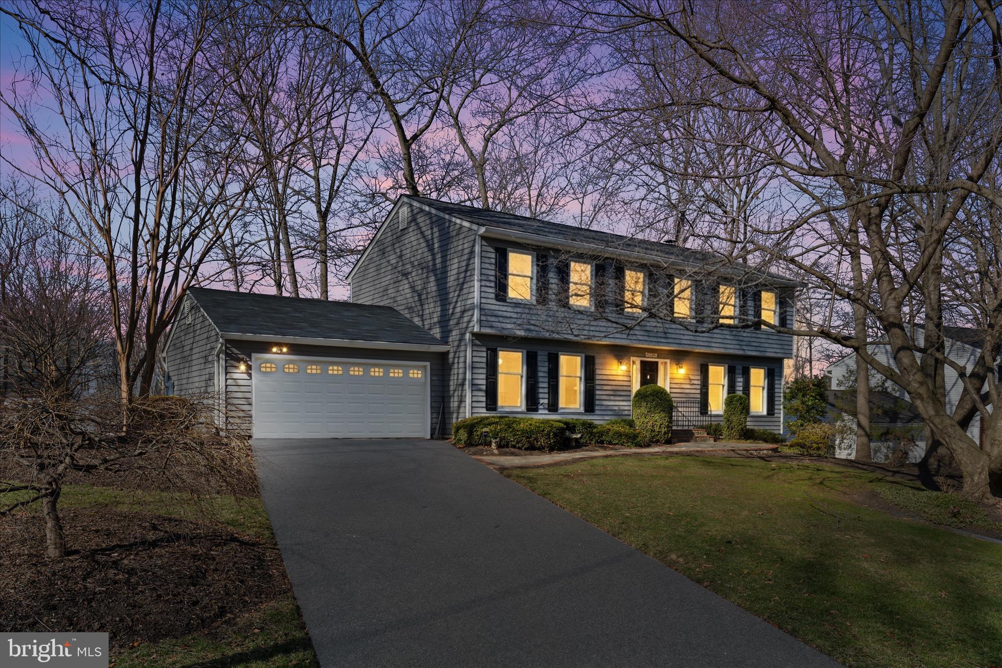 865 Moffett Forge Road Herndon, VA 20170 - Photo 2 of 62 a front view of a house with a yard
