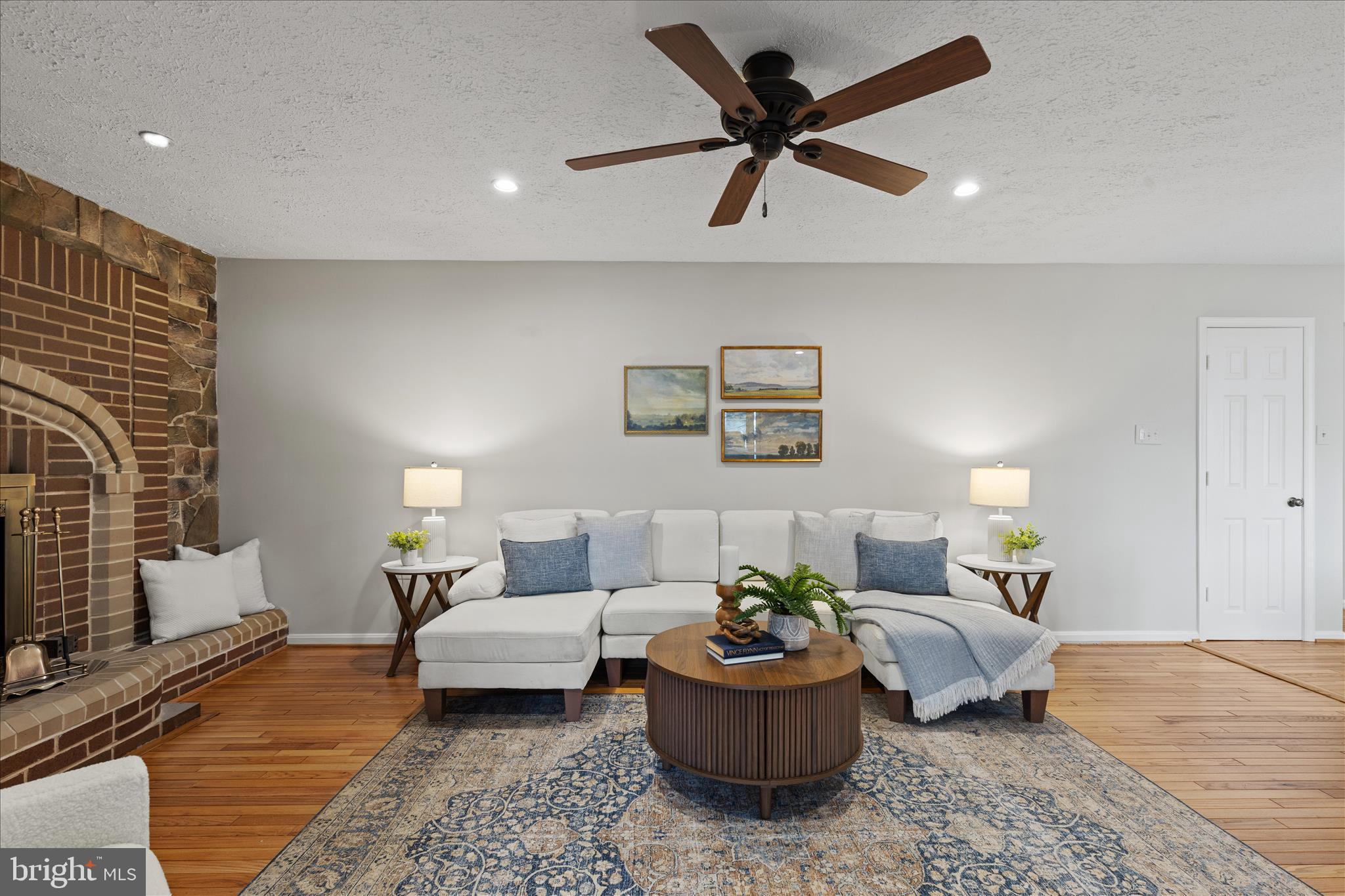 865 Moffett Forge Road Herndon, VA 20170 - Photo 24 of 62 a living room with furniture and a rug