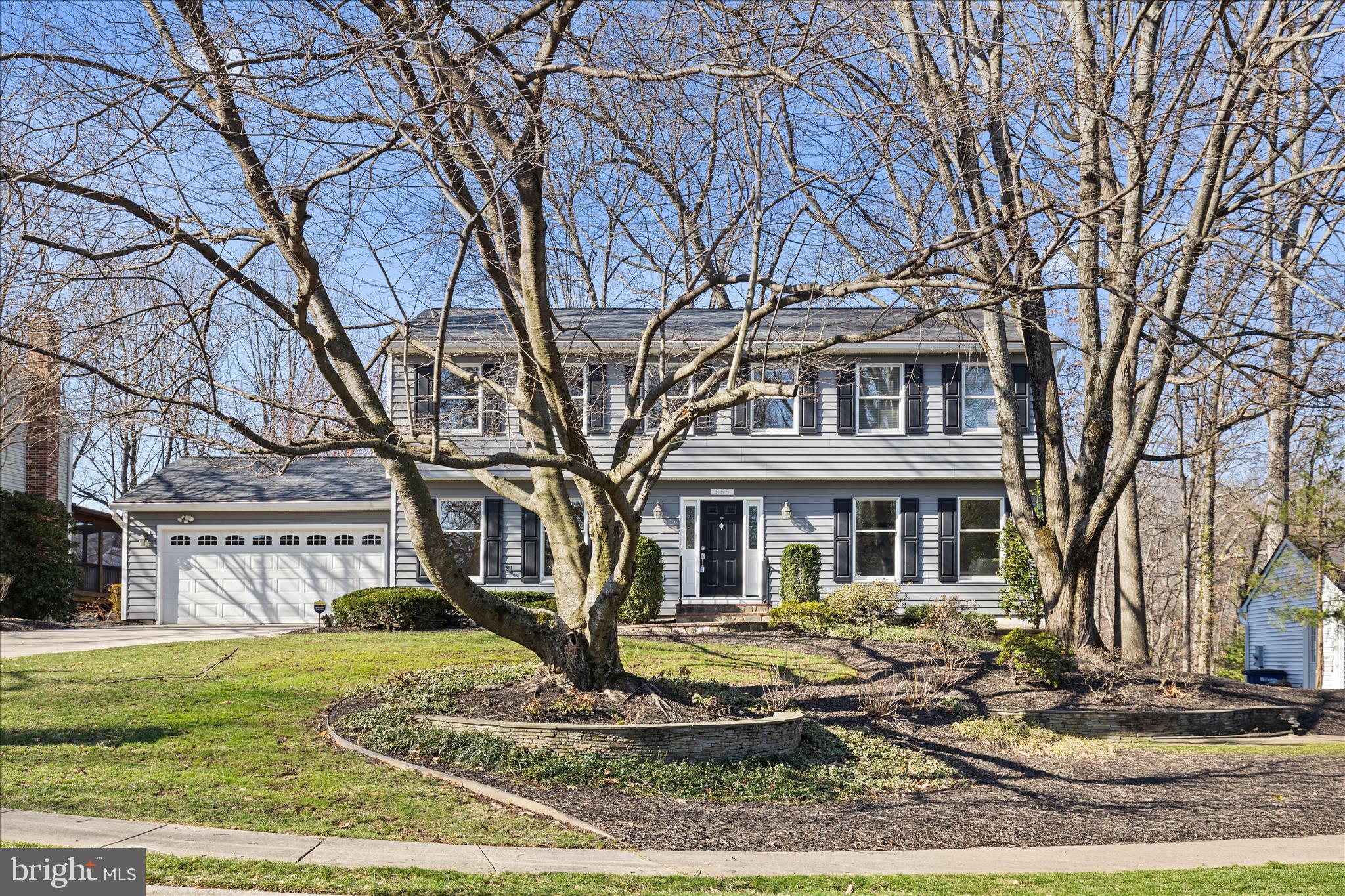 865 Moffett Forge Road Herndon, VA 20170 - Photo 3 of 62 a front view of a house with a yard