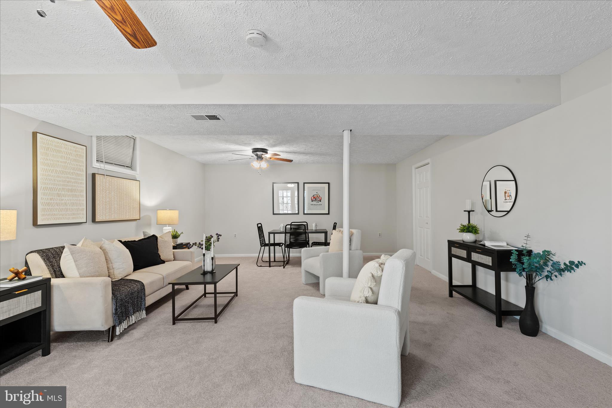 865 Moffett Forge Road Herndon, VA 20170 - Photo 45 of 62 a living room with furniture a rug and a lamp