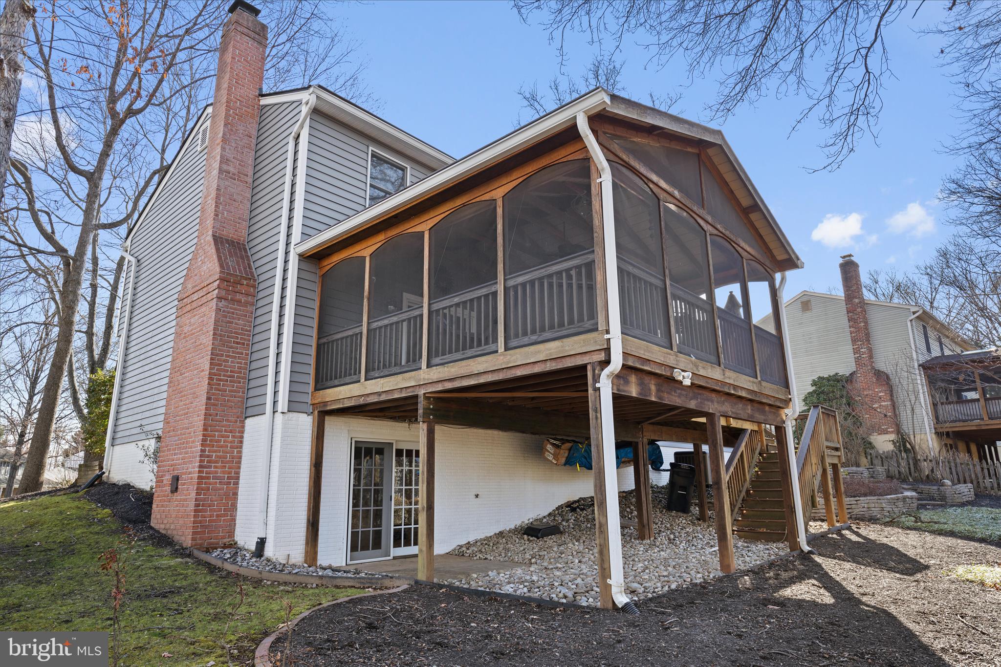 865 Moffett Forge Road Herndon, VA 20170 - Photo 56 of 62 a front view of a house with garden