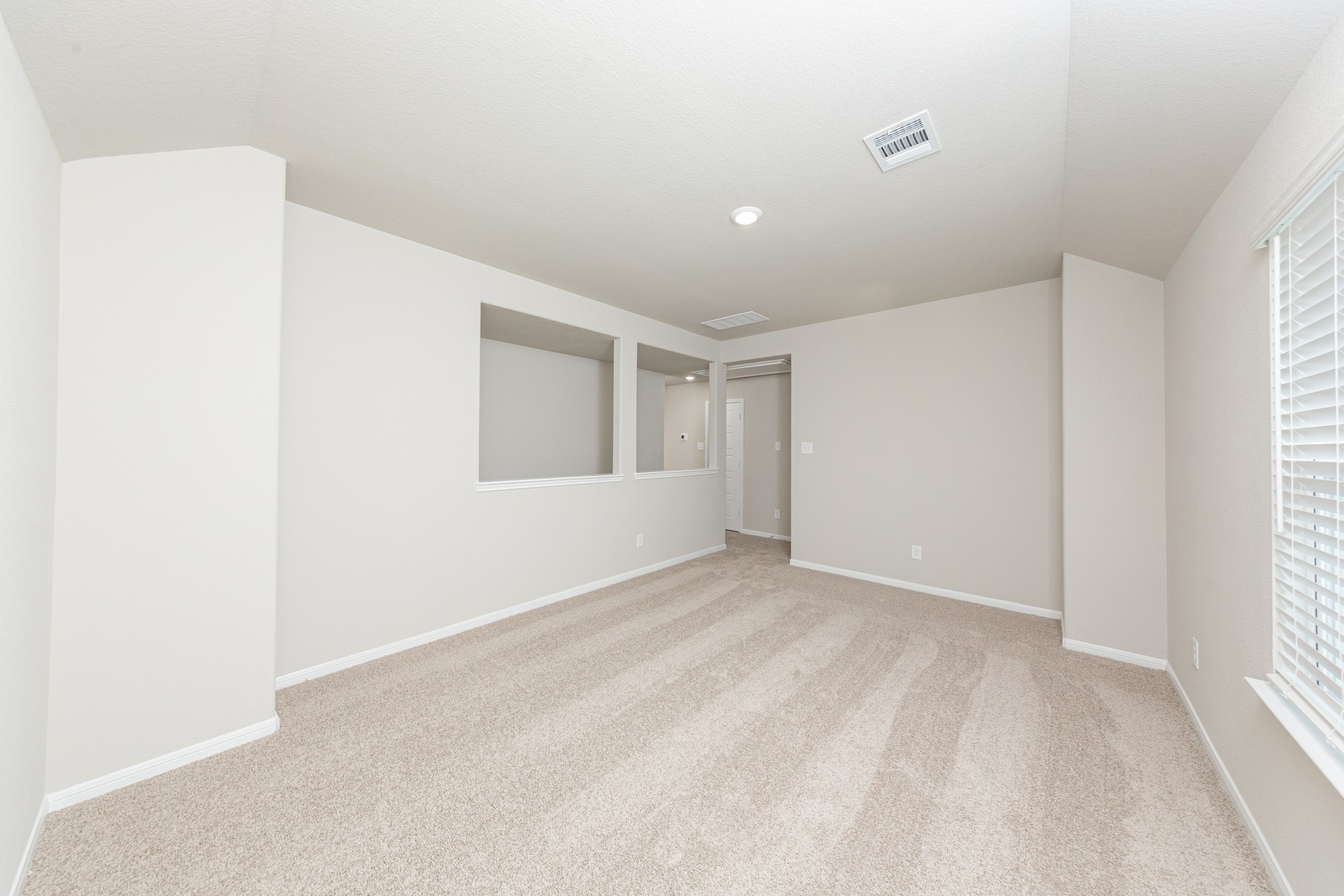 9258 Grace Rdg Drive Willis, TX 77318 - Photo 13 of 24 a view of an empty room with a window