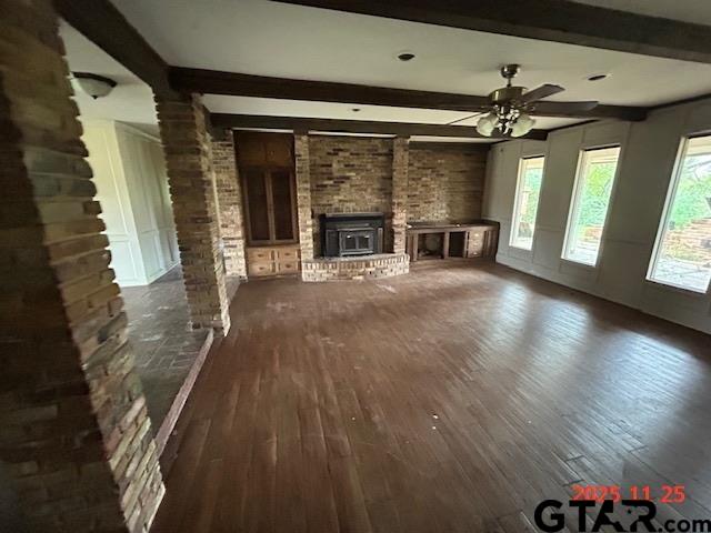 1092 An County Road Frankston, TX 75763 - Photo 7 of 16 a view of an empty room with a fireplace and a window