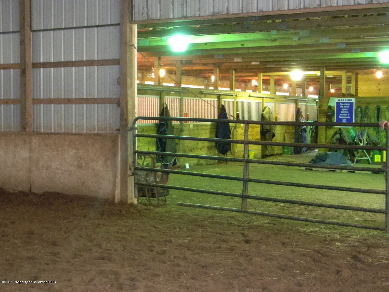 387 Falls Road Falls, PA 18615 - Photo 13 of 32 View to Stall Area from Indoor Arena