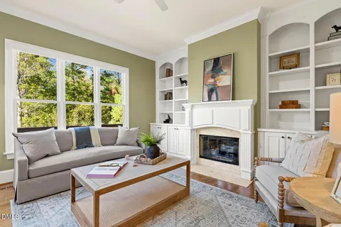 a bedroom with a bed and a view of kitchen