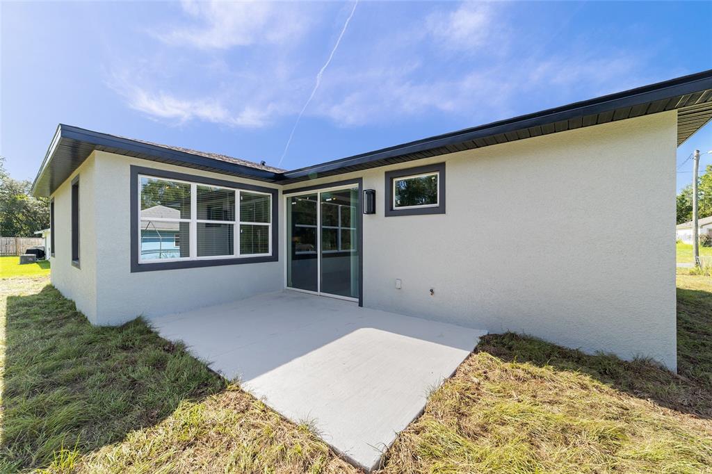 7 Oak Trail Ocala, FL 34472 - Photo 55 of 73 a backyard of a house