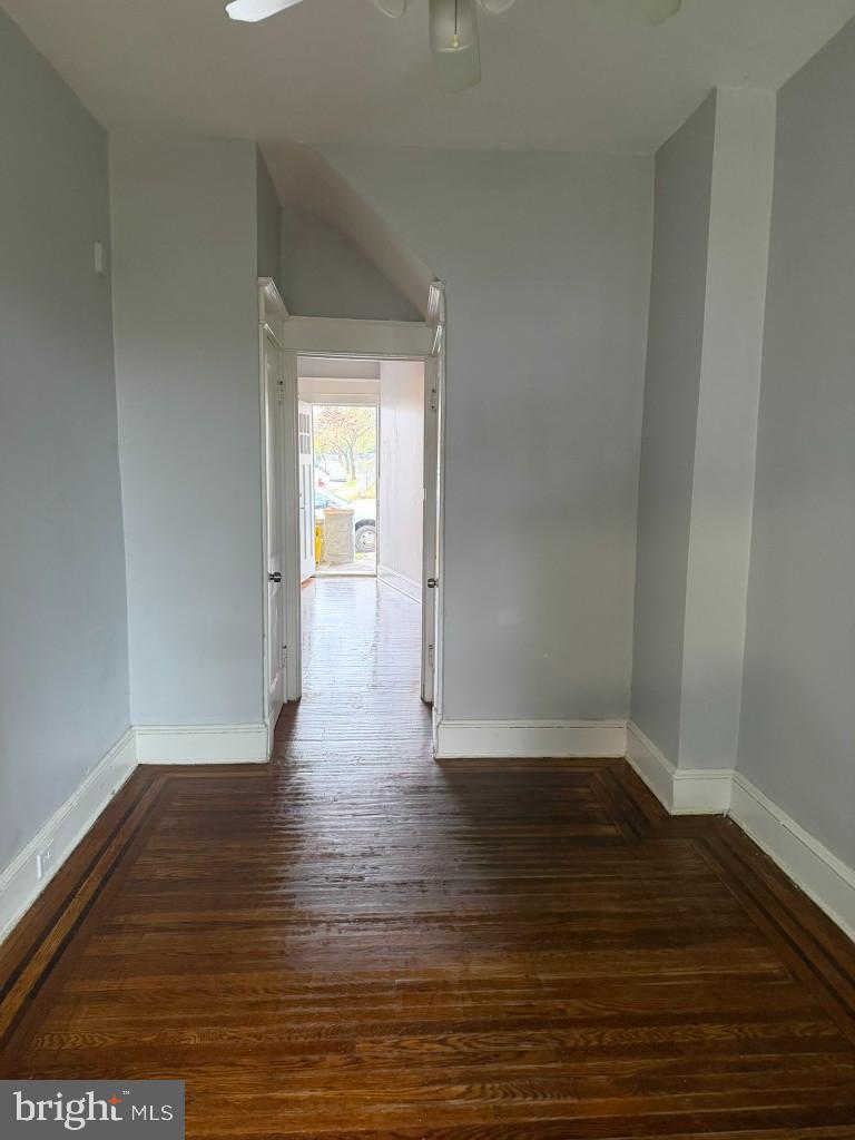 2464 Keyworth Avenue Baltimore, MD 21215 - Photo 11 of 36 a view of an empty room and wooden floor