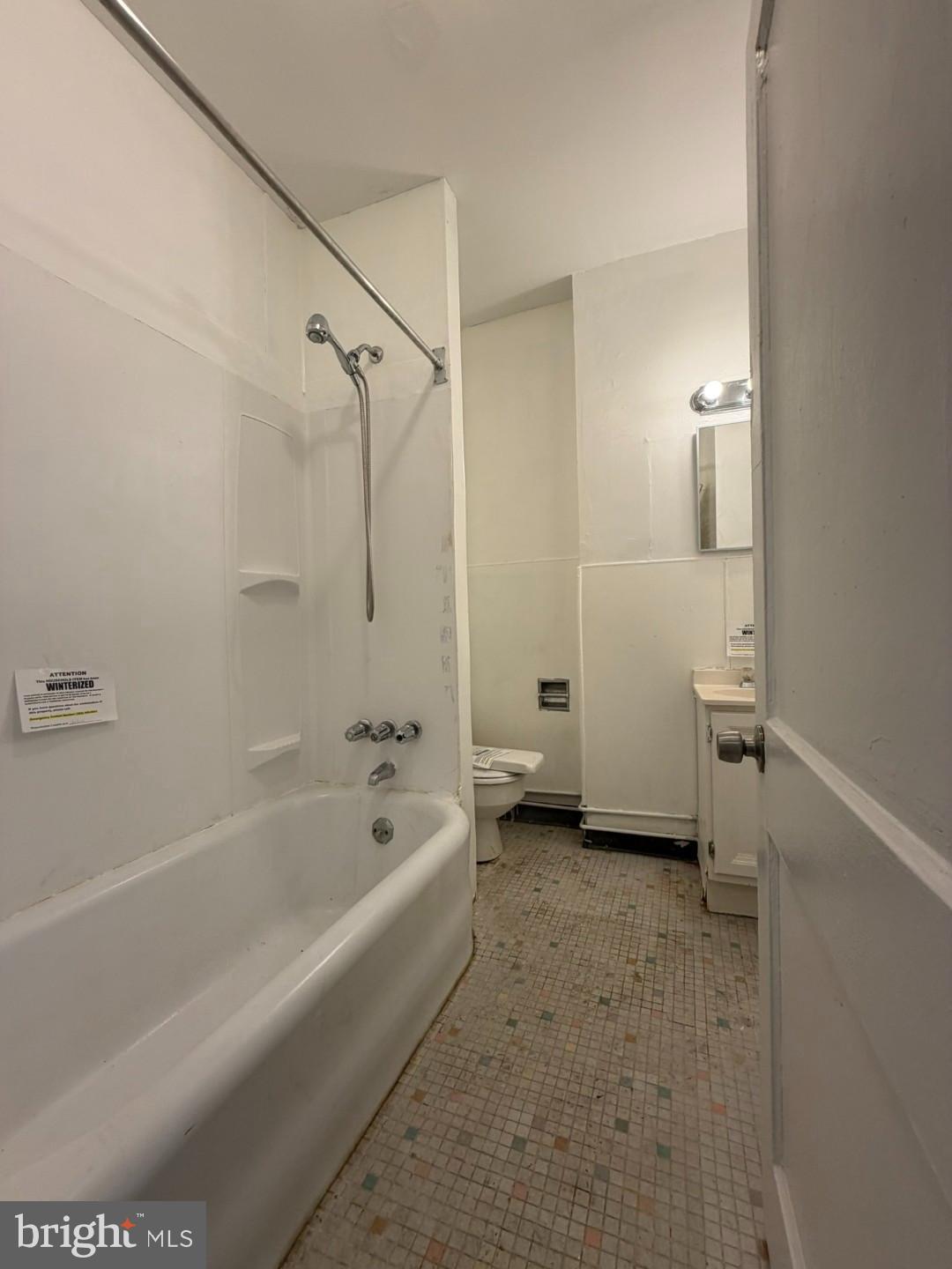2464 Keyworth Avenue Baltimore, MD 21215 - Photo 28 of 36 a bathroom with a bathtub and a shower