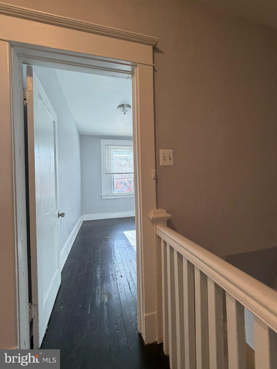 2464 Keyworth Avenue Baltimore, MD 21215 - Photo 29 of 36 a view of a hallway with wooden floor and closet