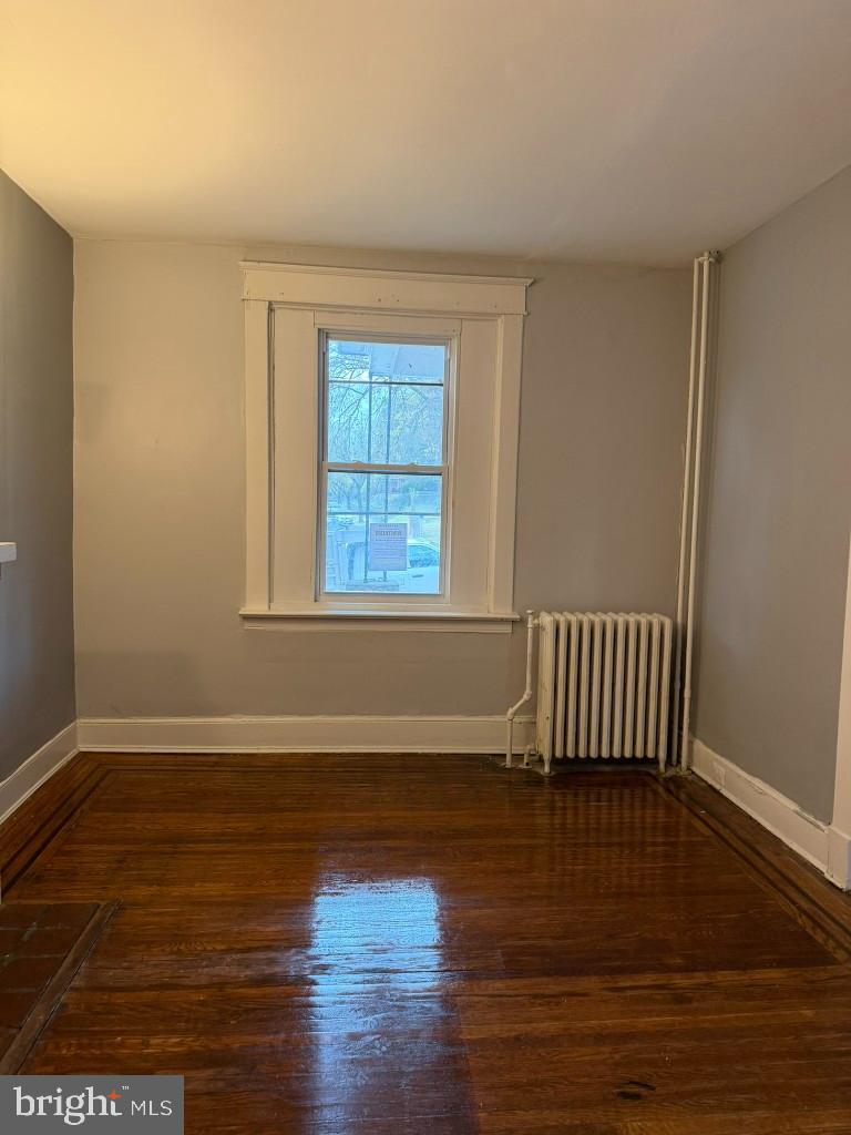 2464 Keyworth Avenue Baltimore, MD 21215 - Photo 8 of 36 a view of empty room with wooden floor and fan