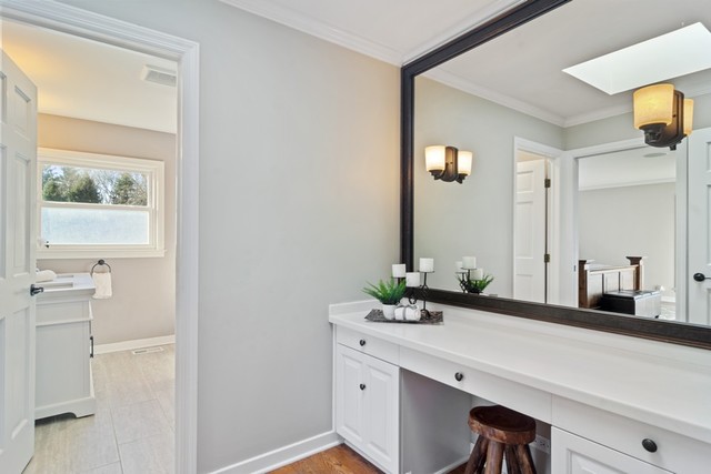 84 North Highland Road Inverness, IL 60067 - Photo 8 of 18 a bathroom with a sink and a mirror