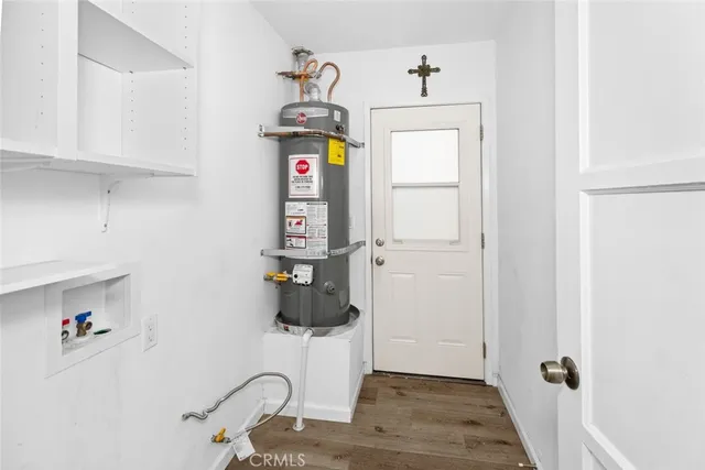 a bathroom with a sink and a shower curtain