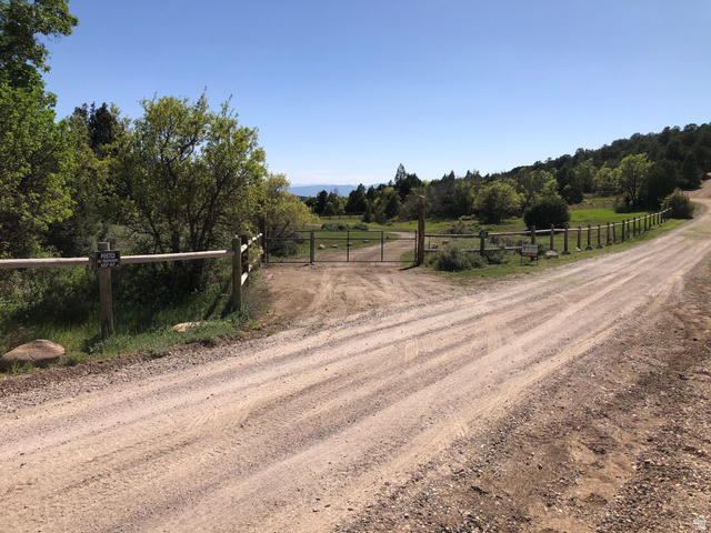 149 Meadow Road, Unit 149 Mount Pleasant, UT 84647 - Photo 3 of 16 View of street with a gate and a rural view