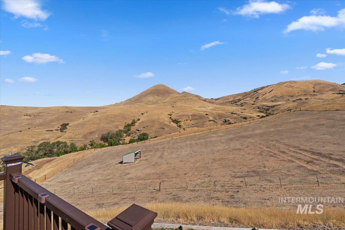 11660 Timber Butte Road Sweet, ID 83670 - Photo 42 of 49 Expansive landscape featuring rolling hills and a clear blue sky