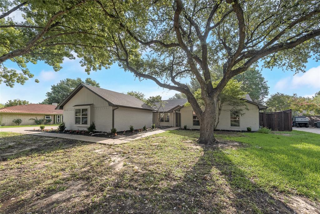 View of front of house featuring brick siding