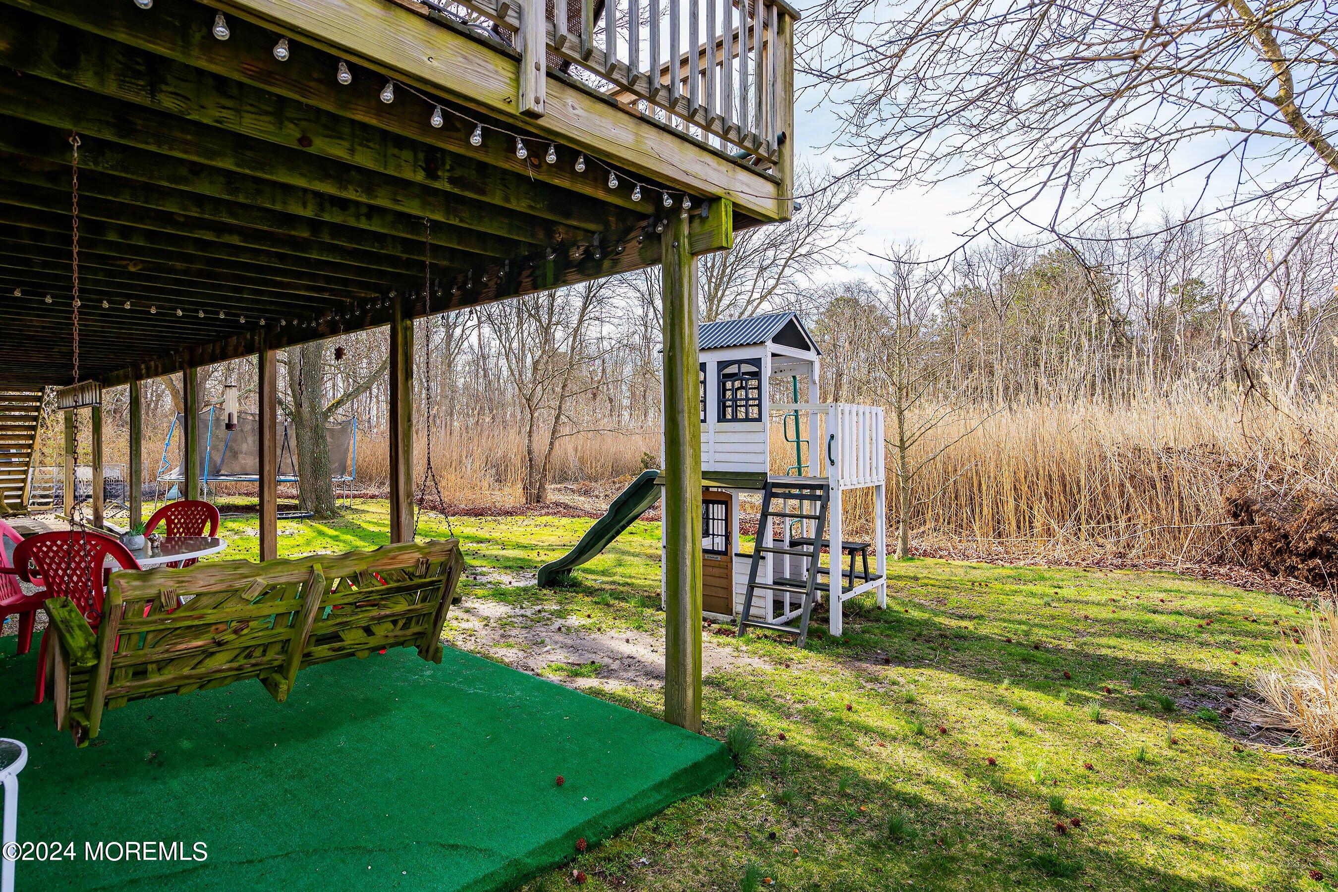 110 Marine Road Waretown, NJ 08758 - Photo 6 of 38 31-Rear Patio and Yard 1