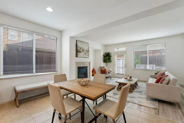 a living room with furniture and a table