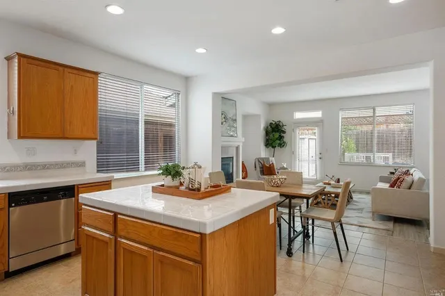 a view of a dining room with furniture and window