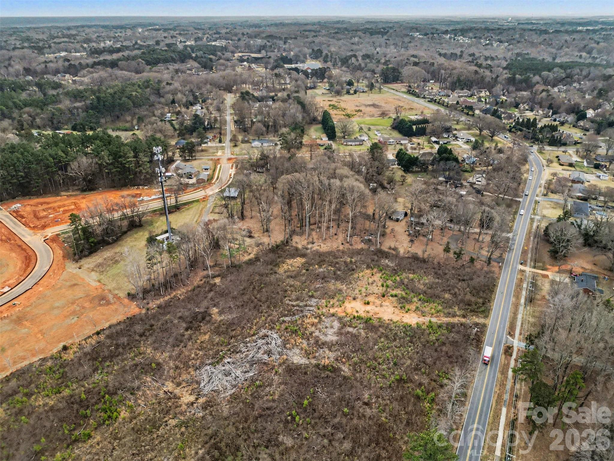 11733 Idlewild Road Matthews, NC 28105 - Photo 14 of 19 an aerial view of residential house and parking space