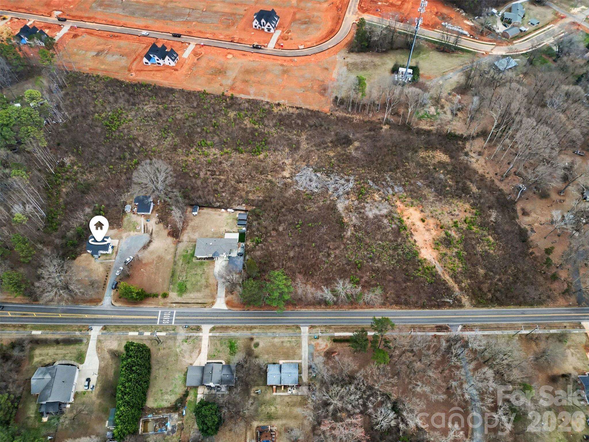 11733 Idlewild Road Matthews, NC 28105 - Photo 17 of 19 an aerial view of a house with a yard