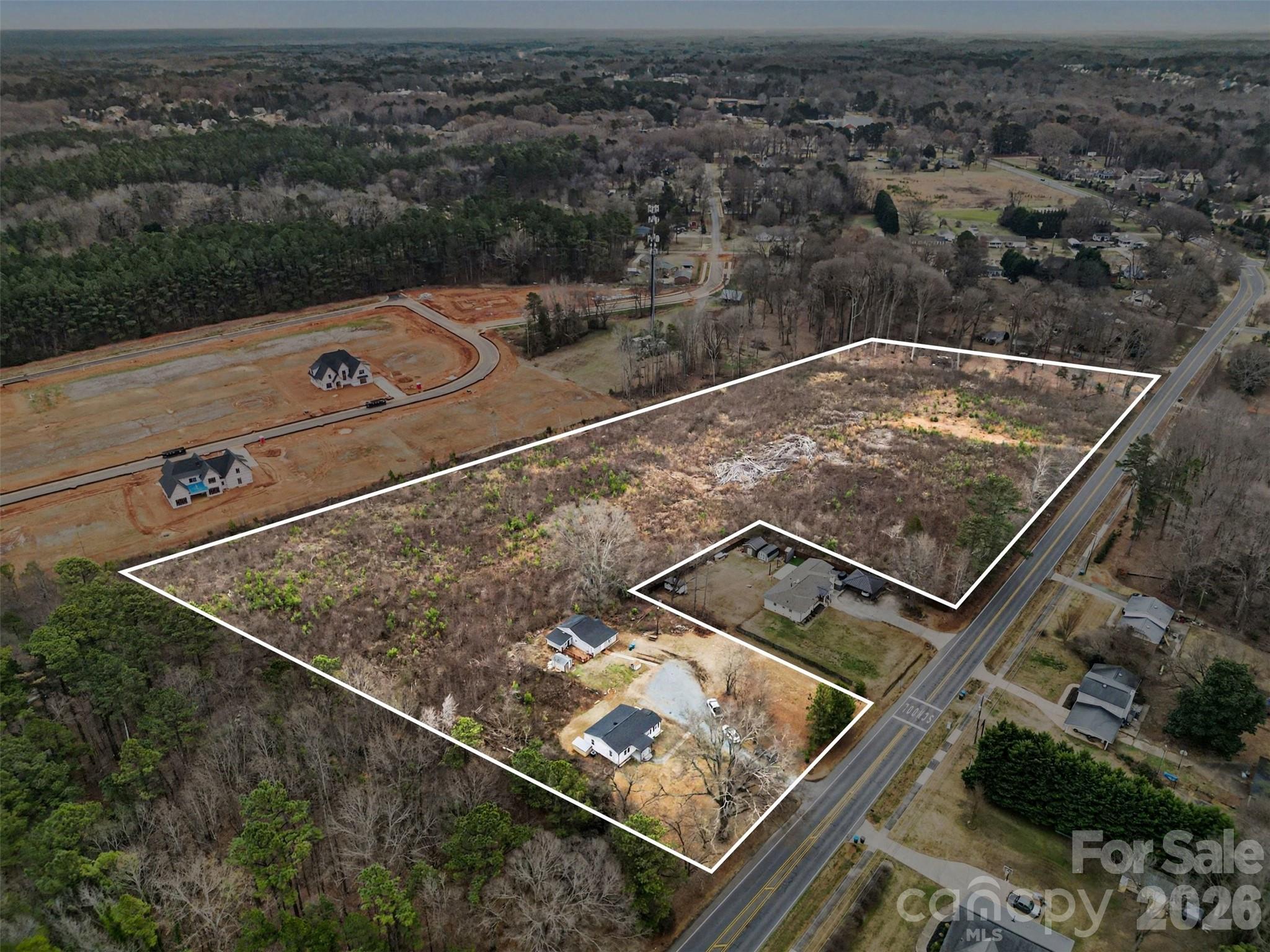11733 Idlewild Road Matthews, NC 28105 - Photo 2 of 19 an aerial view of roof