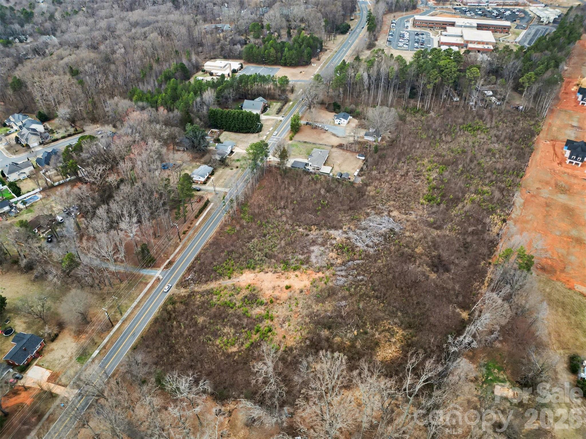 11733 Idlewild Road Matthews, NC 28105 - Photo 6 of 19 a view of a yard with large trees