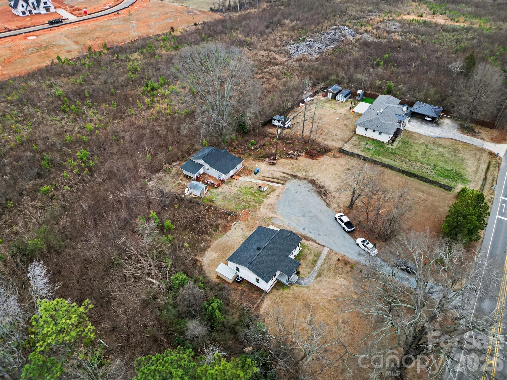11733 Idlewild Road Matthews, NC 28105 - Photo 7 of 19 an aerial view of a house with a yard