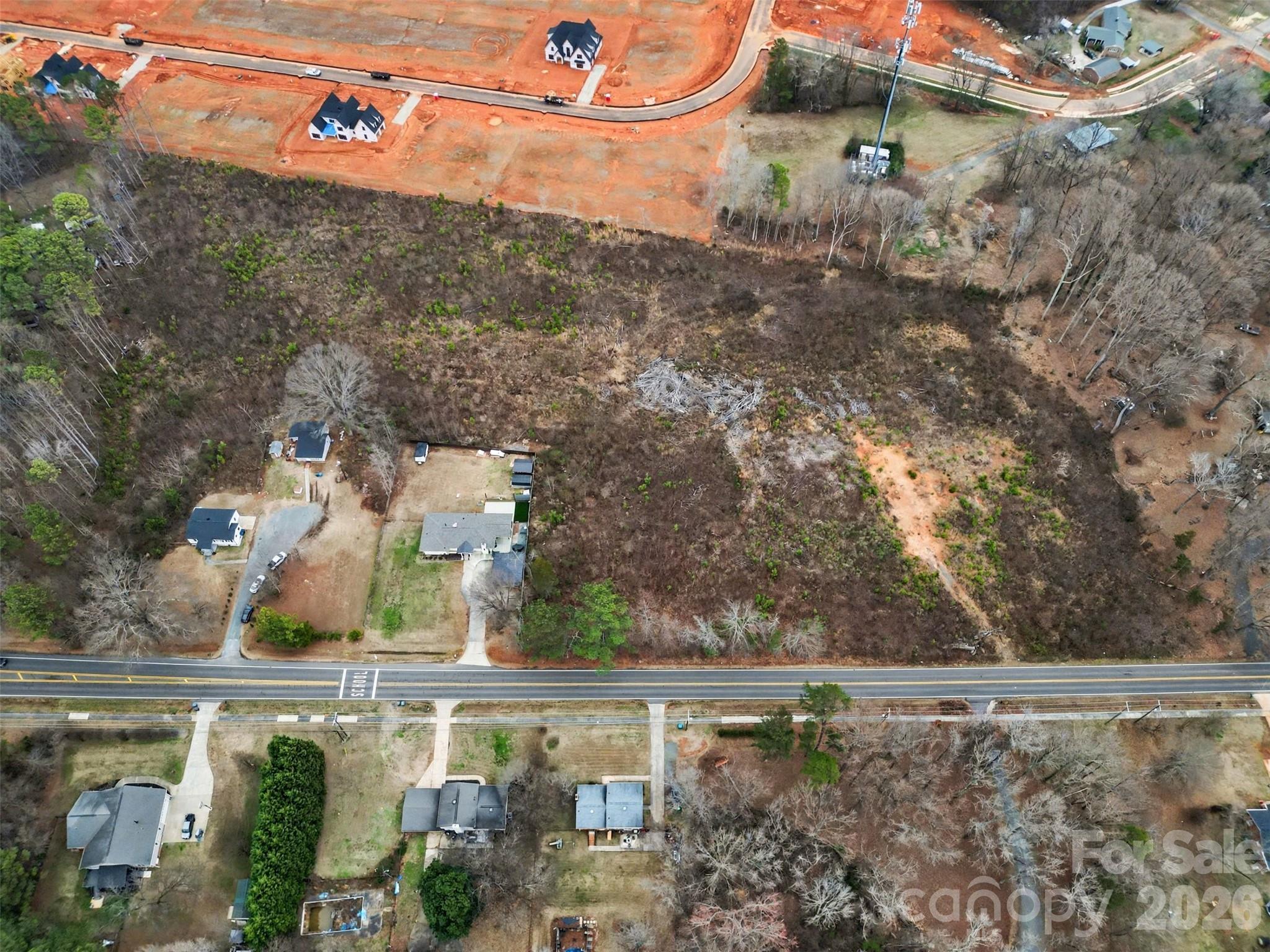 11733 Idlewild Road Matthews, NC 28105 - Photo 9 of 19 an aerial view of a house with outdoor space