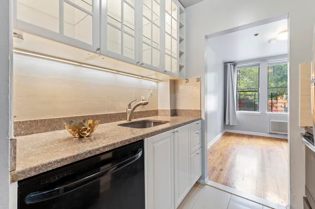 a view of bathroom with dual sinks