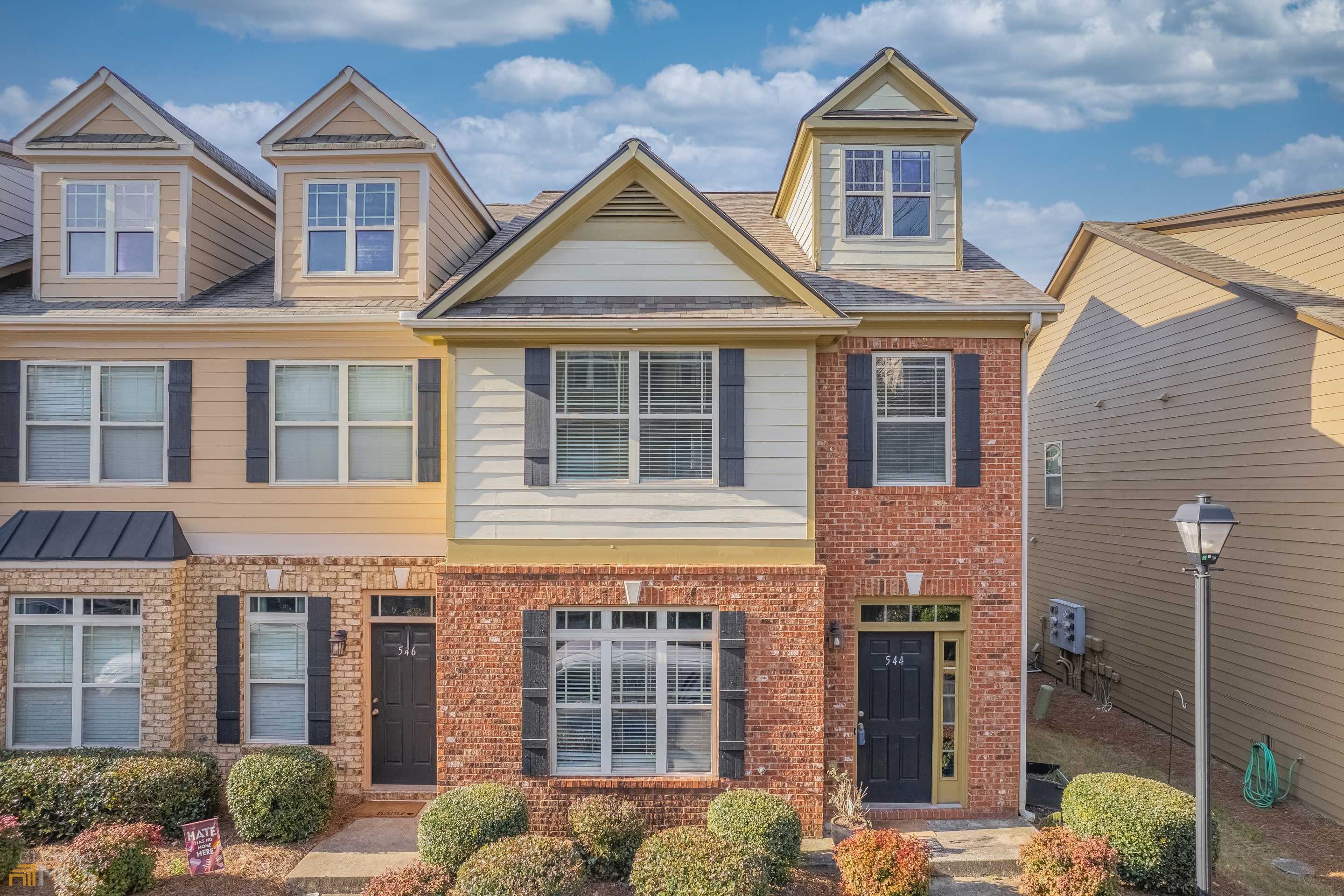 544 Ridge View Crossing Woodstock, GA 30188 - Photo 1 of 1 a front view of a house with a yard