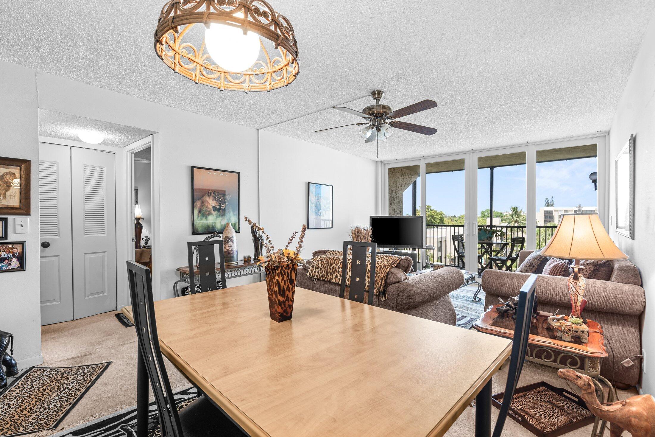 17 Royal Palm Way, Unit 504 Boca Raton, FL 33432 - Photo 12 of 44 a view of a dining room with furniture