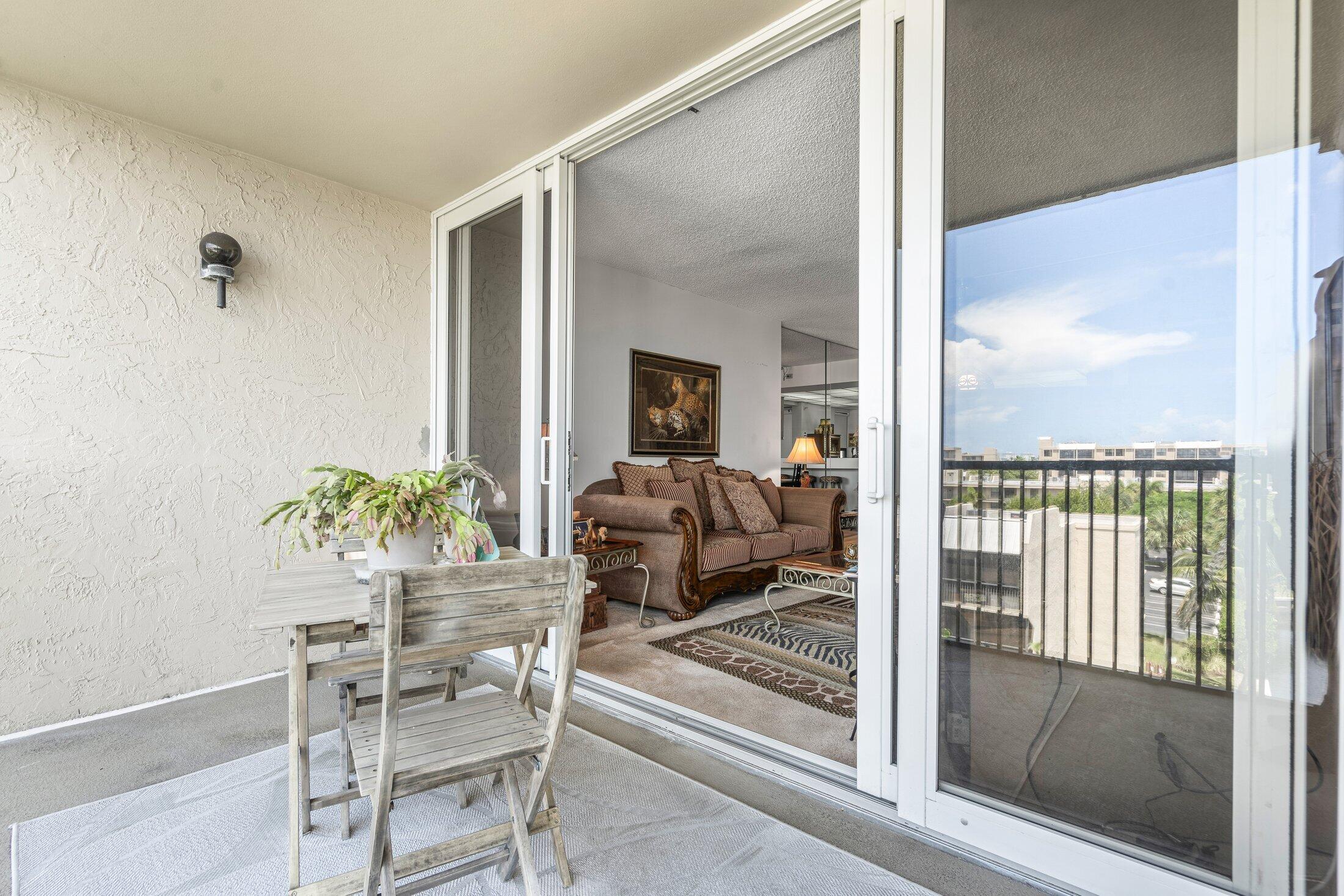 17 Royal Palm Way, Unit 504 Boca Raton, FL 33432 - Photo 25 of 44 a dining room with furniture