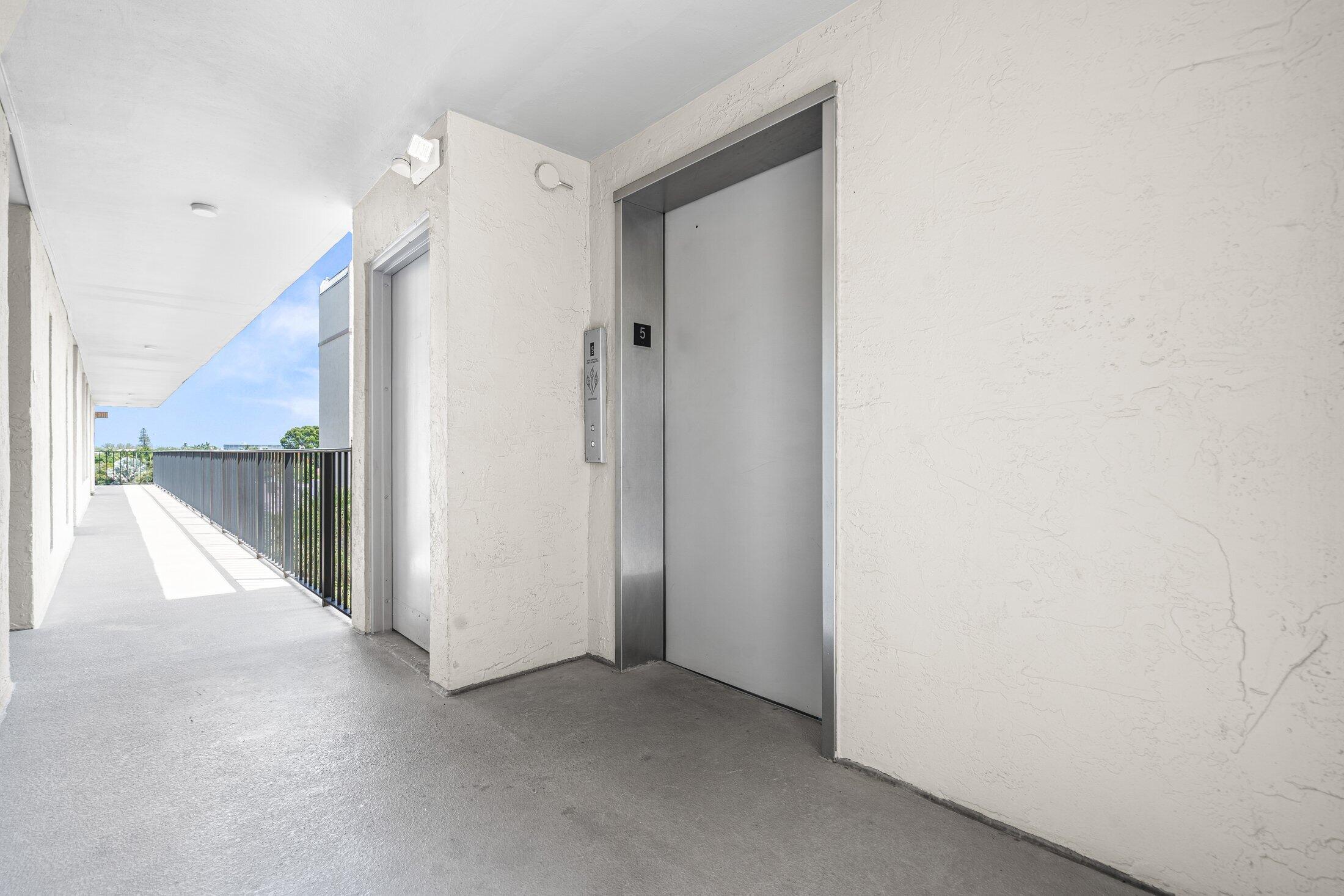 17 Royal Palm Way, Unit 504 Boca Raton, FL 33432 - Photo 28 of 44 a view of hallway with stairs