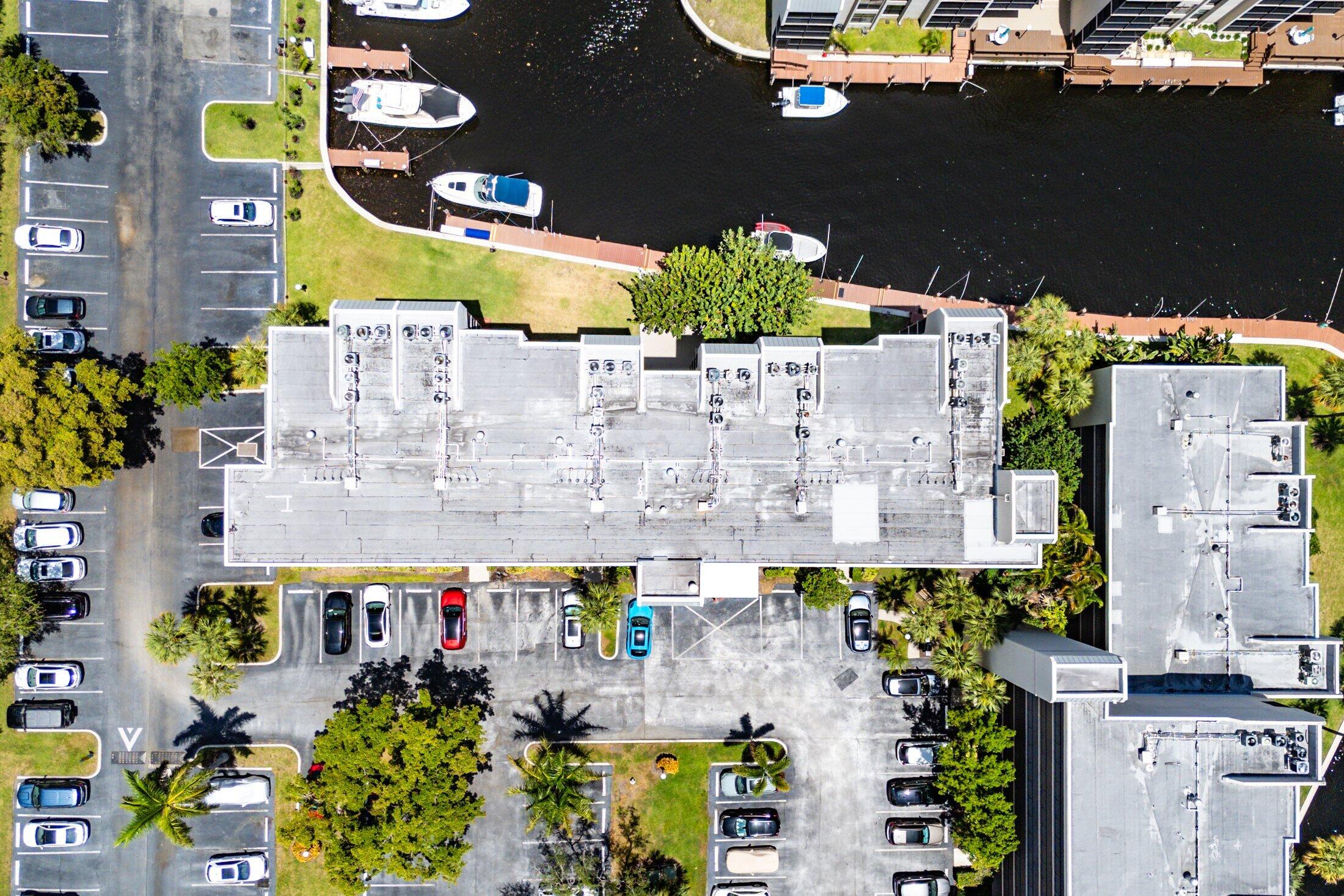 17 Royal Palm Way, Unit 504 Boca Raton, FL 33432 - Photo 33 of 44 an aerial view of multiple houses with outdoor space