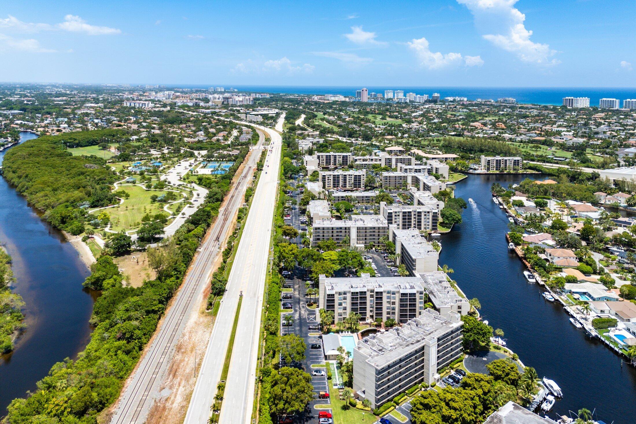 17 Royal Palm Way, Unit 504 Boca Raton, FL 33432 - Photo 37 of 44 an aerial view of residential houses with outdoor space and river